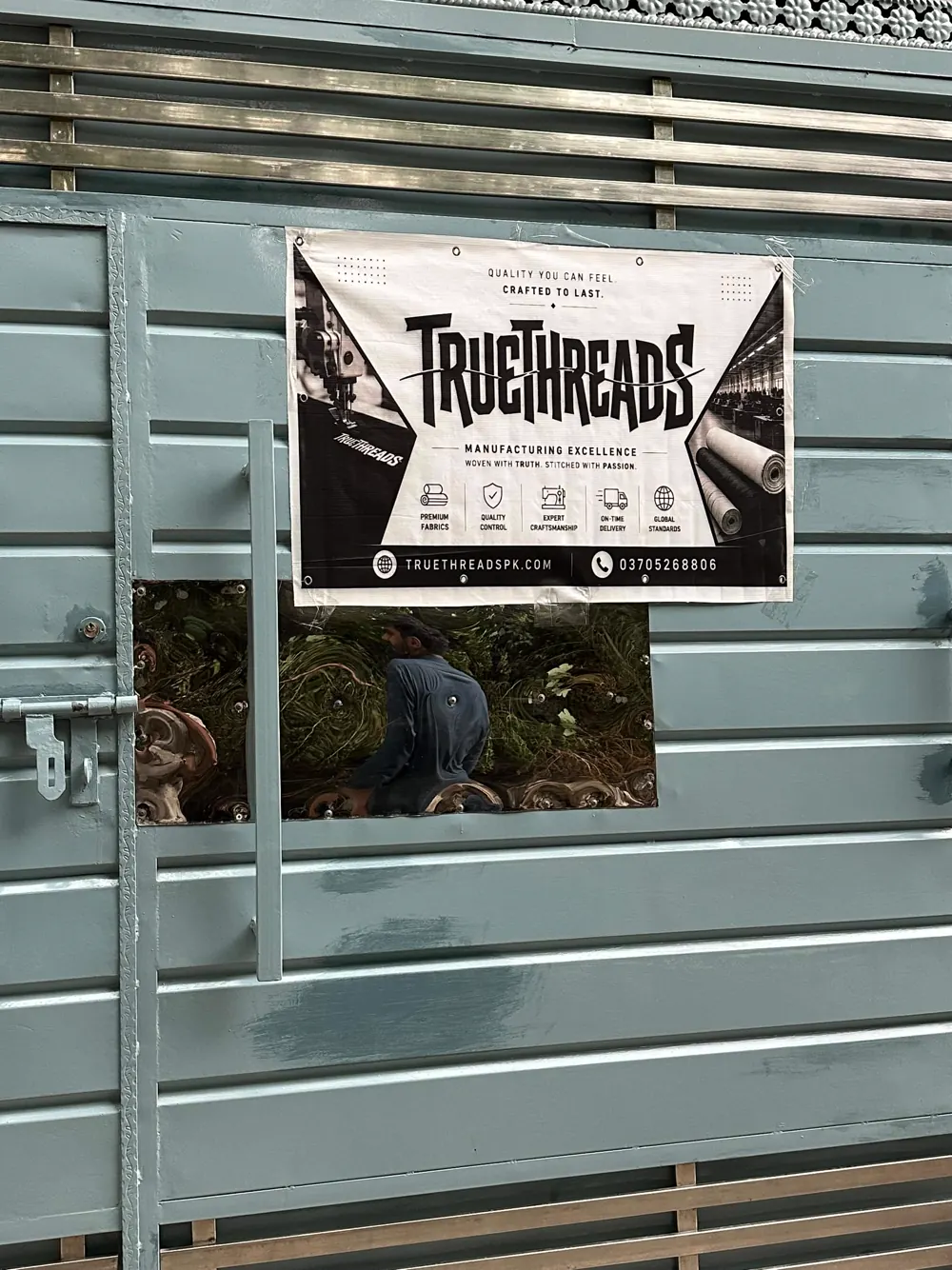 TrueThreads Sialkot Gate — Factory entrance banner · Sialkot, Pakistan